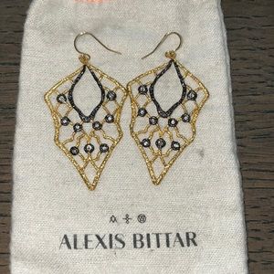 Statement earrings. Gold and dark blue details.